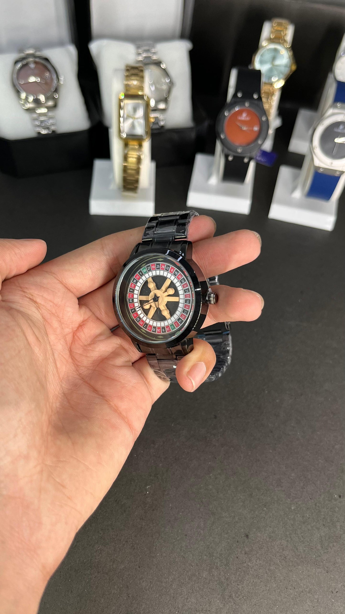 Rotating Dial Wristwatch with a roulette wheel–inspired design.