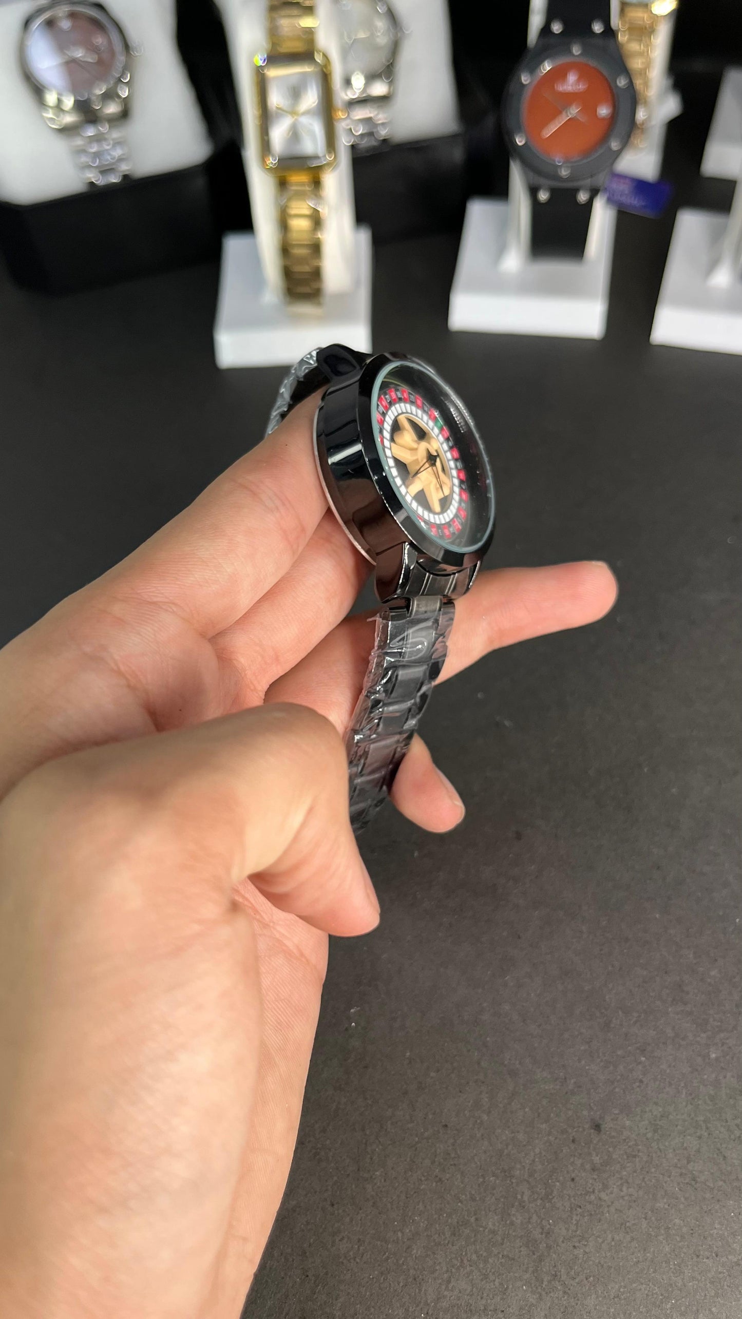 Rotating Dial Wristwatch with a roulette wheel–inspired design.