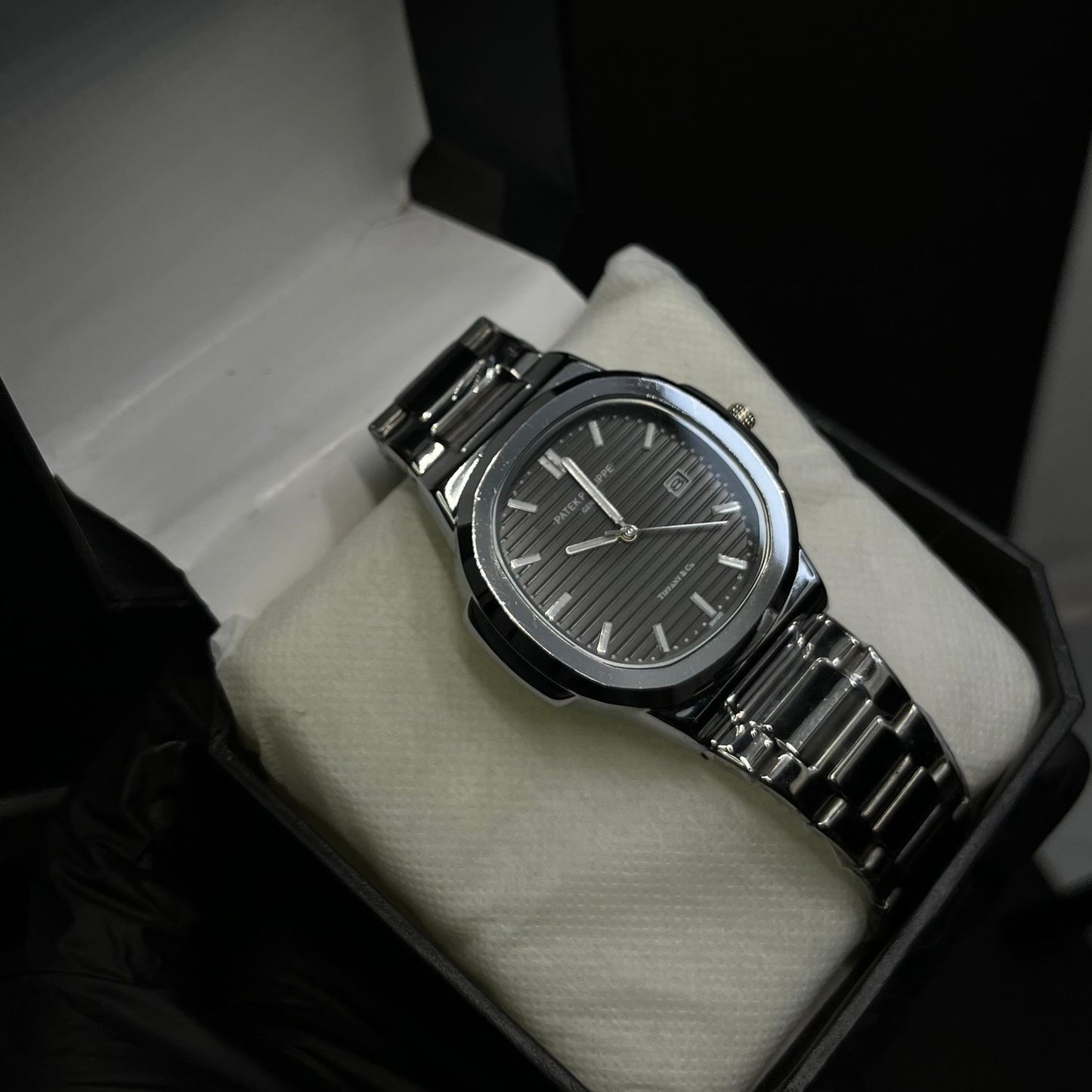 Patek Philippe Nautilus Style – Black Dial Stainless Steel Watch with Date Display