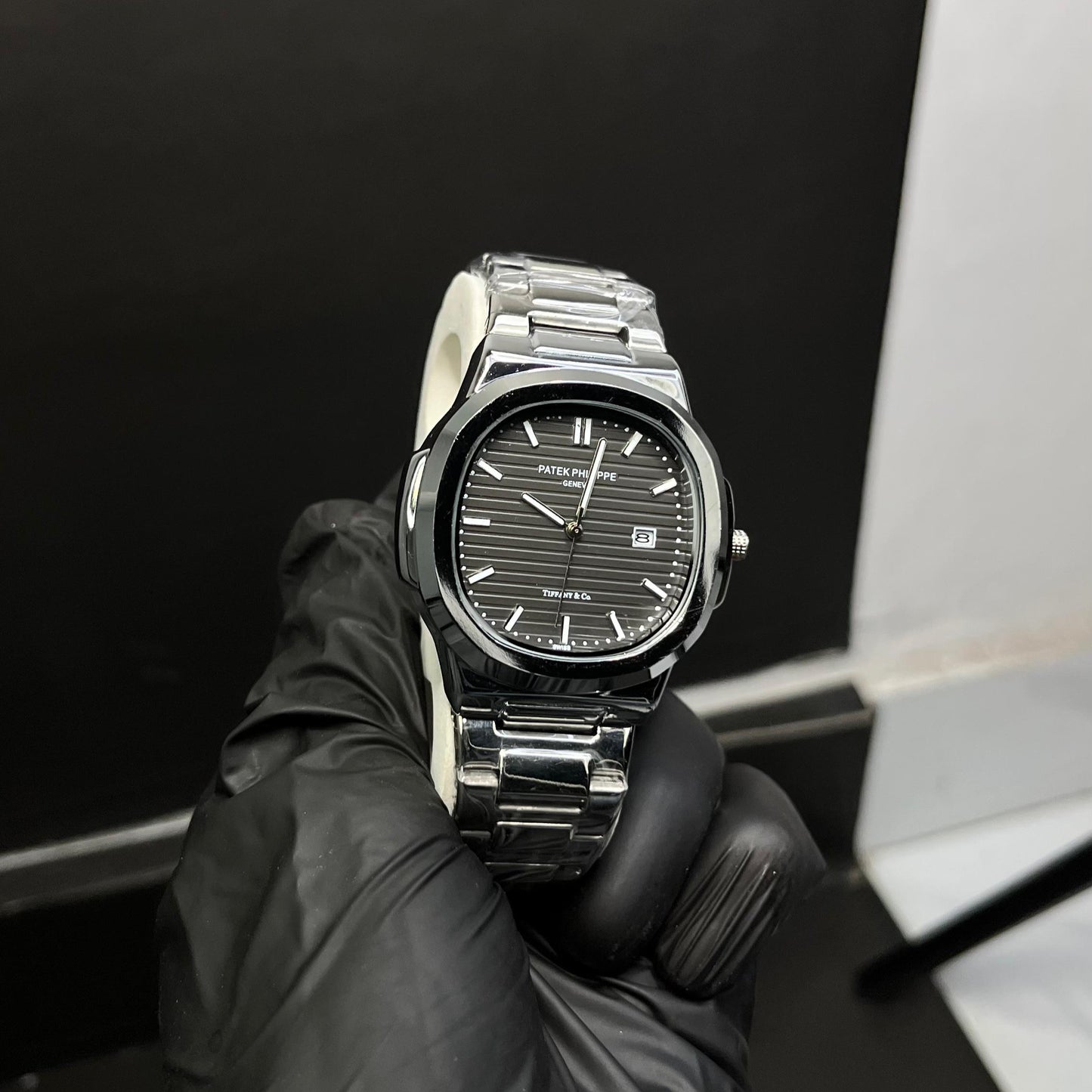 Patek Philippe Nautilus Style – Black Dial Stainless Steel Watch with Date Display