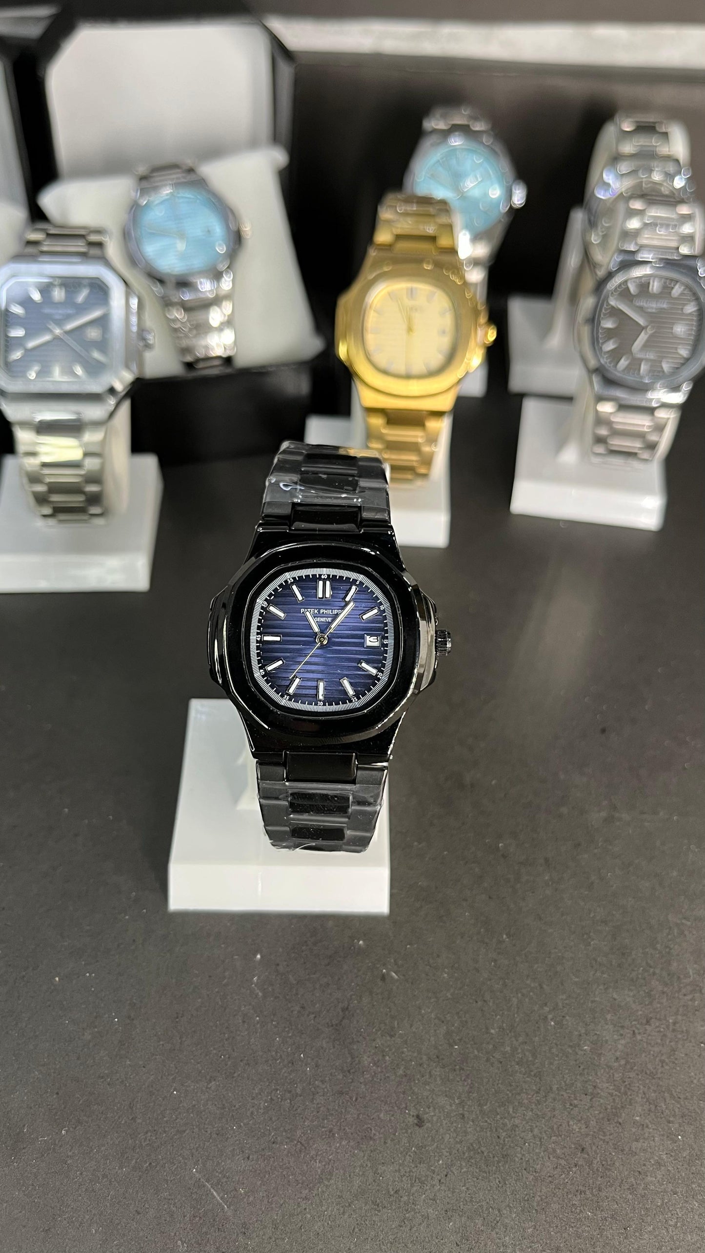 Black Patek Philippe With Light Blue Dial And Branding At The Back