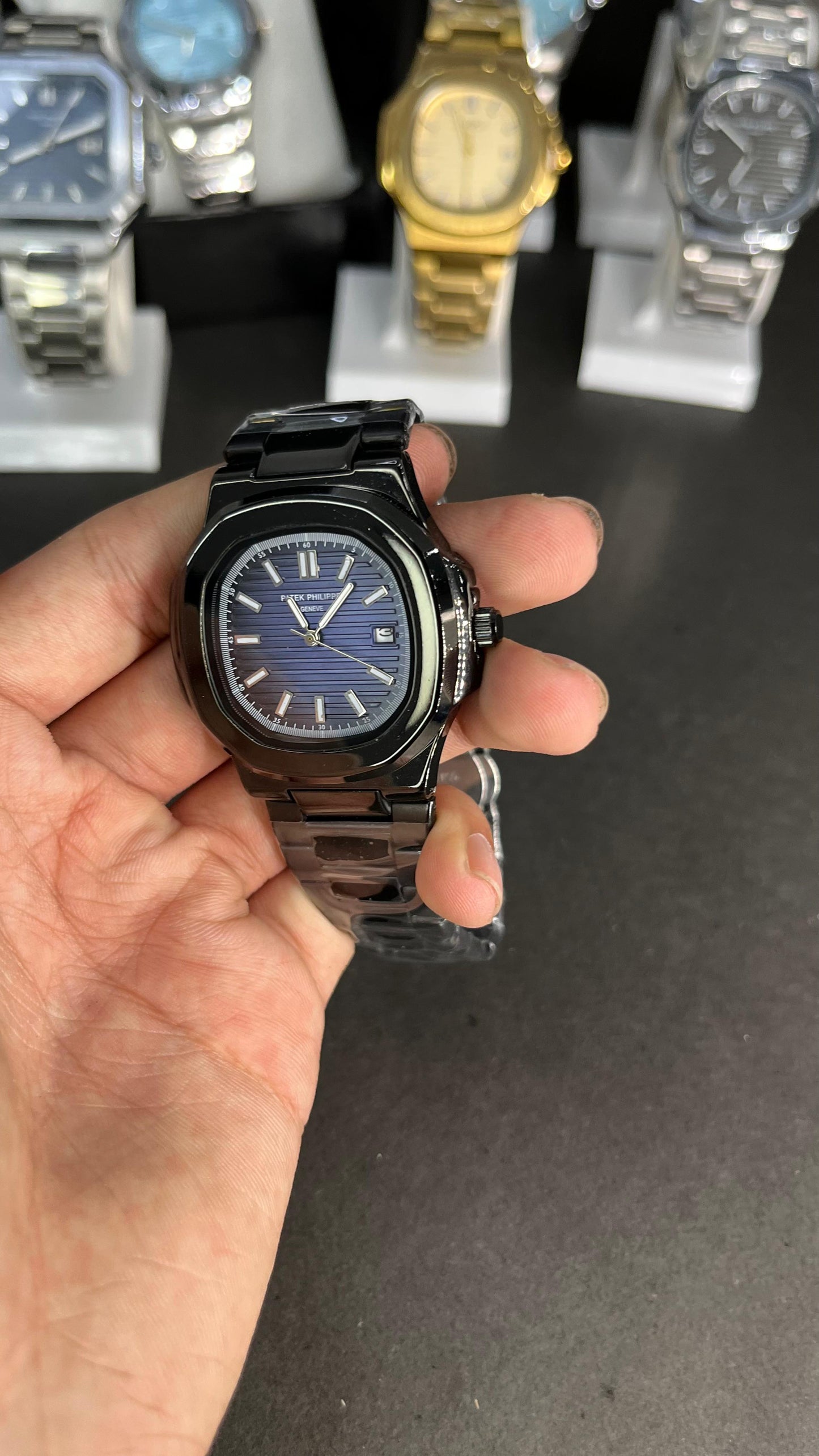 Black Patek Philippe With Light Blue Dial And Branding At The Back