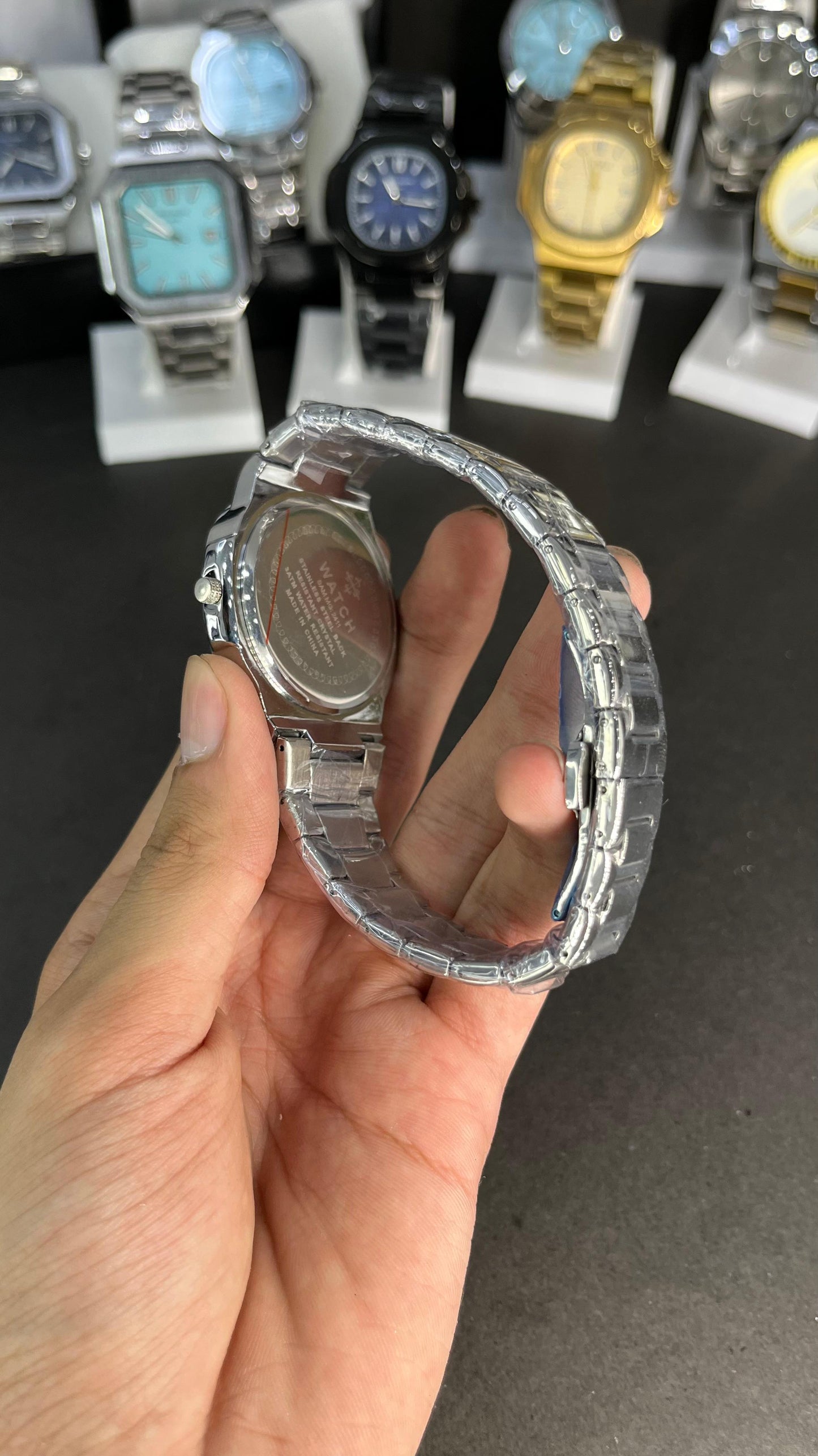 Patek Philippe Nautilus Style – Black Dial Stainless Steel Watch with Date Display