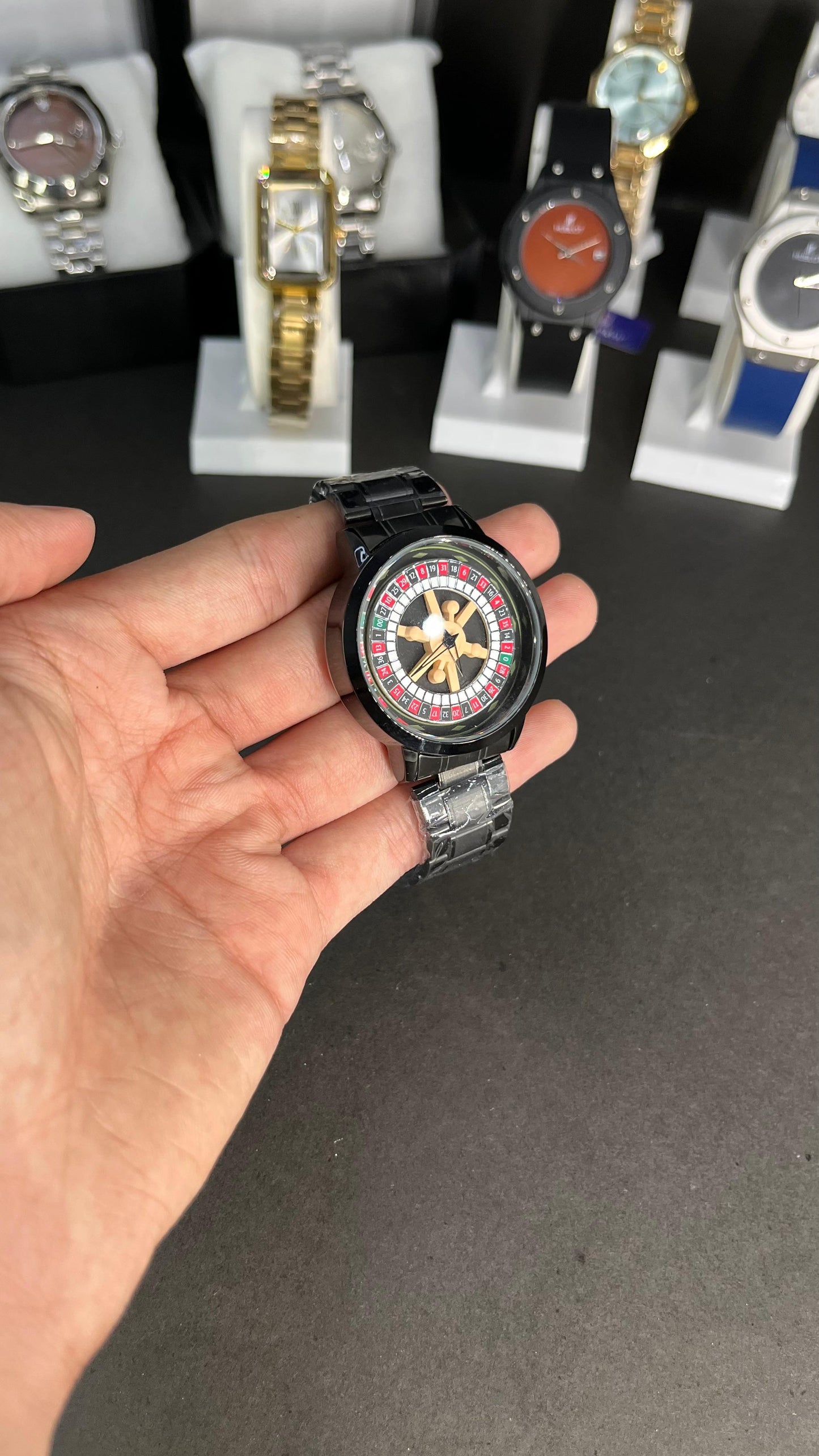 Rotating Dial Wristwatch with a roulette wheel–inspired design.