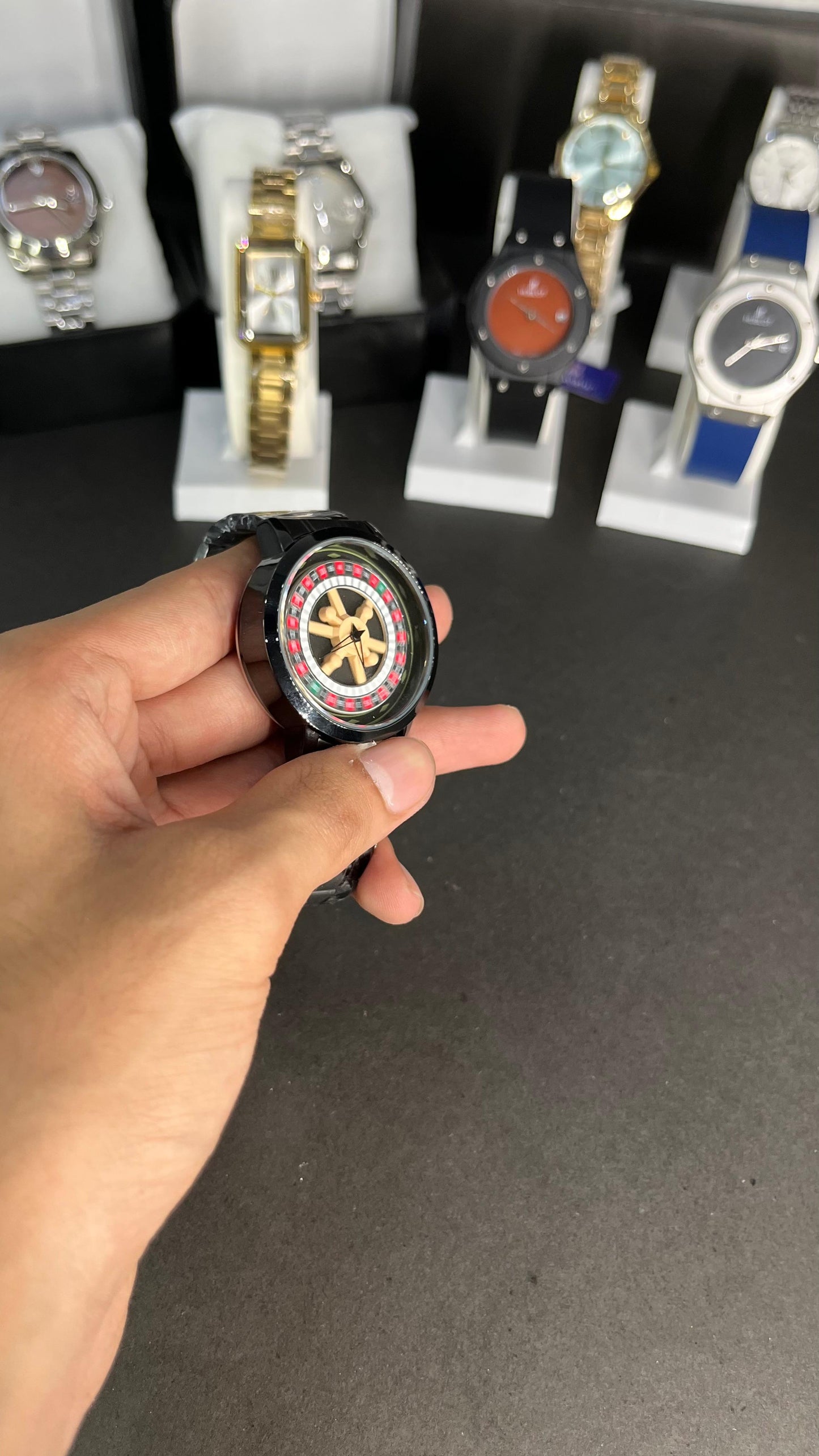 Rotating Dial Wristwatch with a roulette wheel–inspired design.