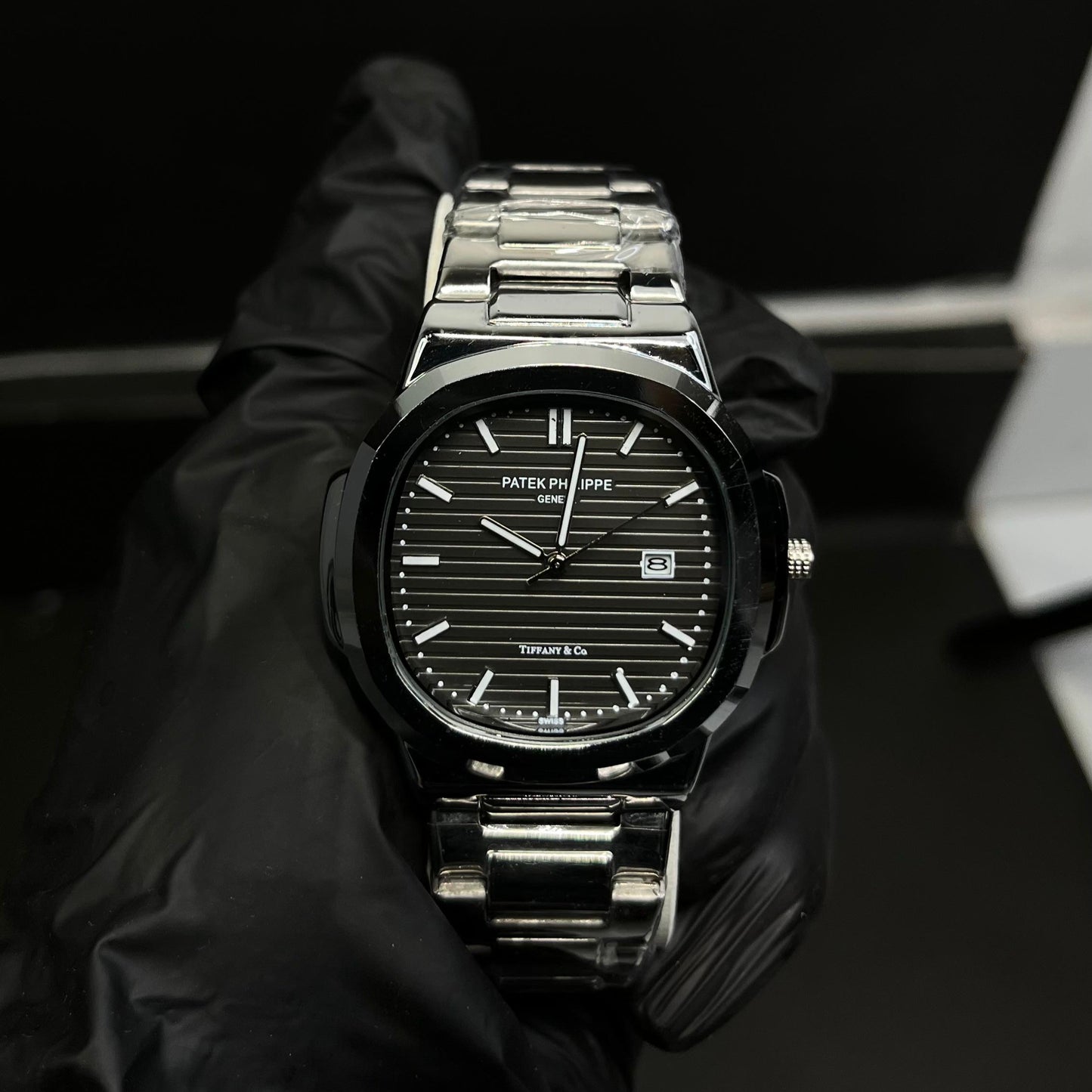 Patek Philippe Nautilus Style – Black Dial Stainless Steel Watch with Date Display