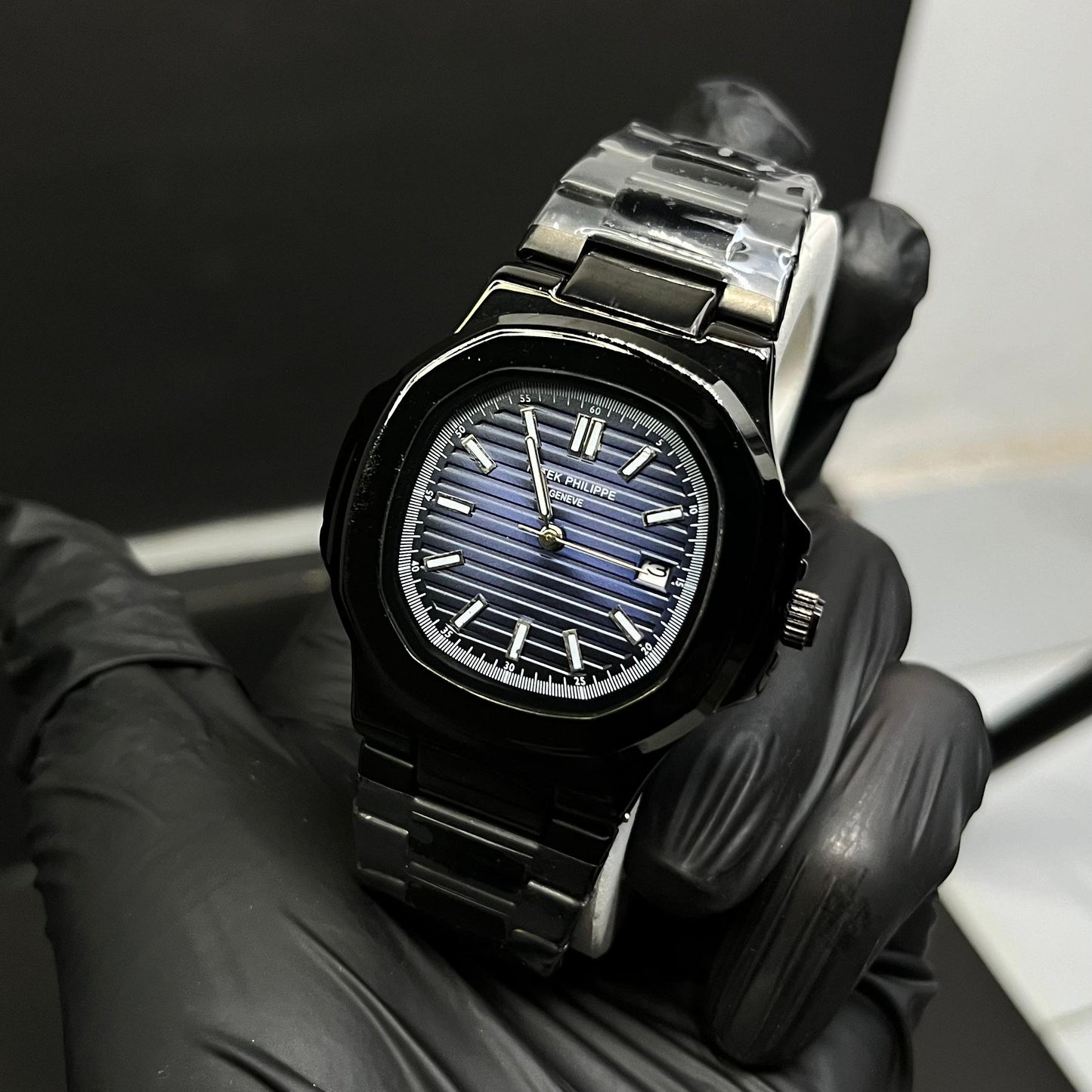Black Patek Philippe With Light Blue Dial And Branding At The Back