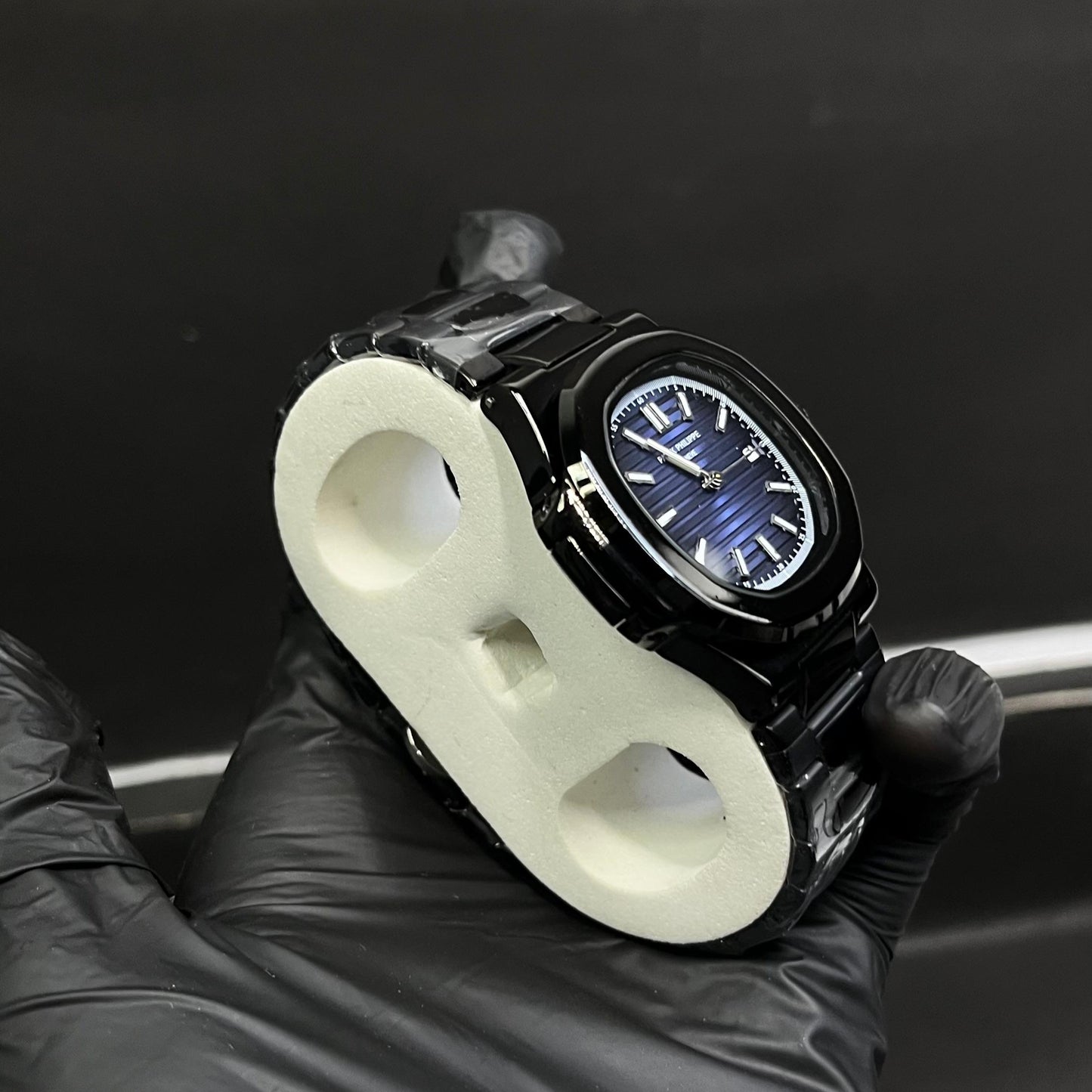 Black Patek Philippe With Light Blue Dial And Branding At The Back